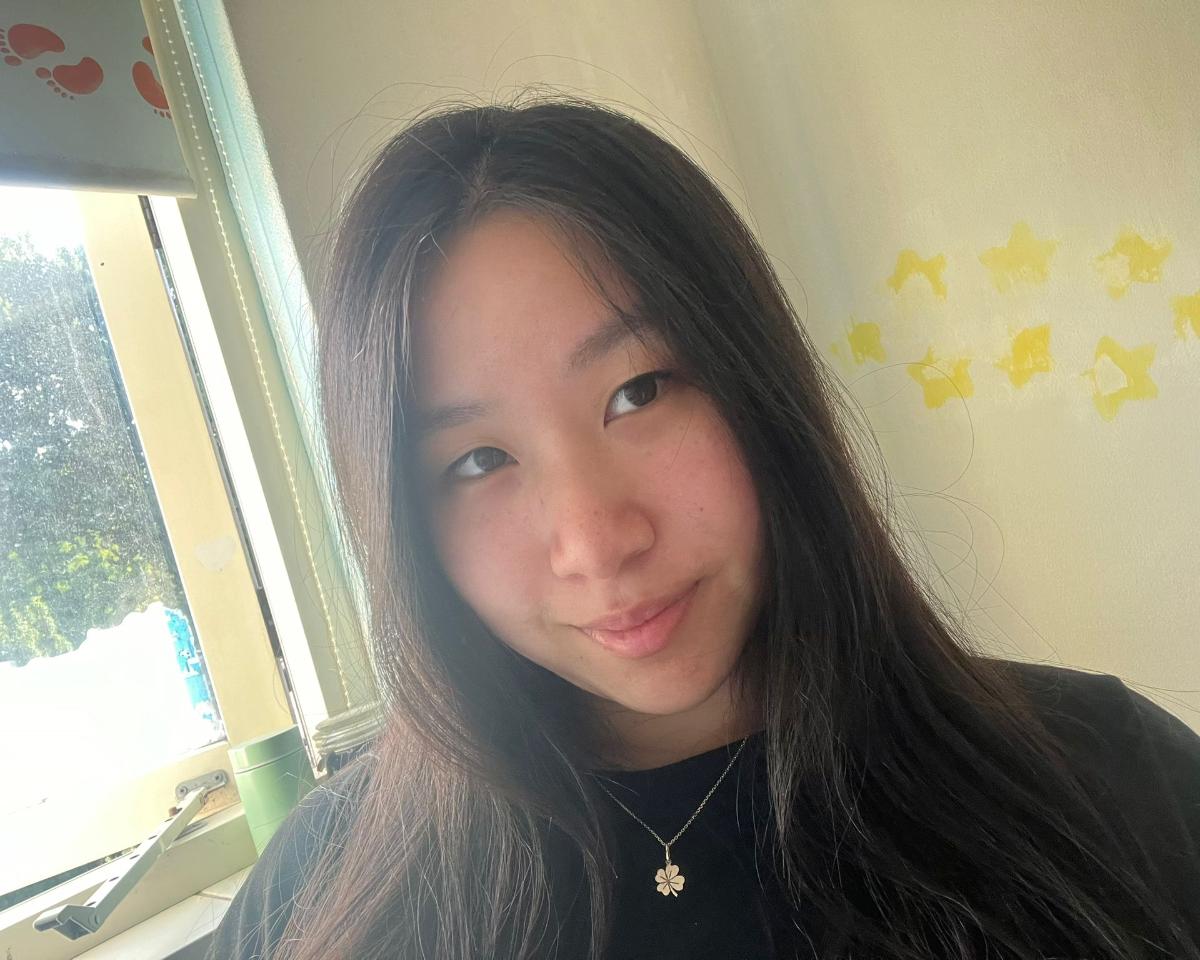 Xin Yi